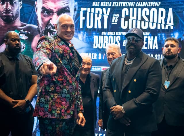 Tyson Fury and Derek Chisora face off during a Press Conference (Getty Images)
