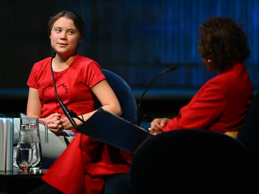 Greta Thunberg speaks on stage during the global launch of “The Climate Book” (Kate Green/Getty Images)