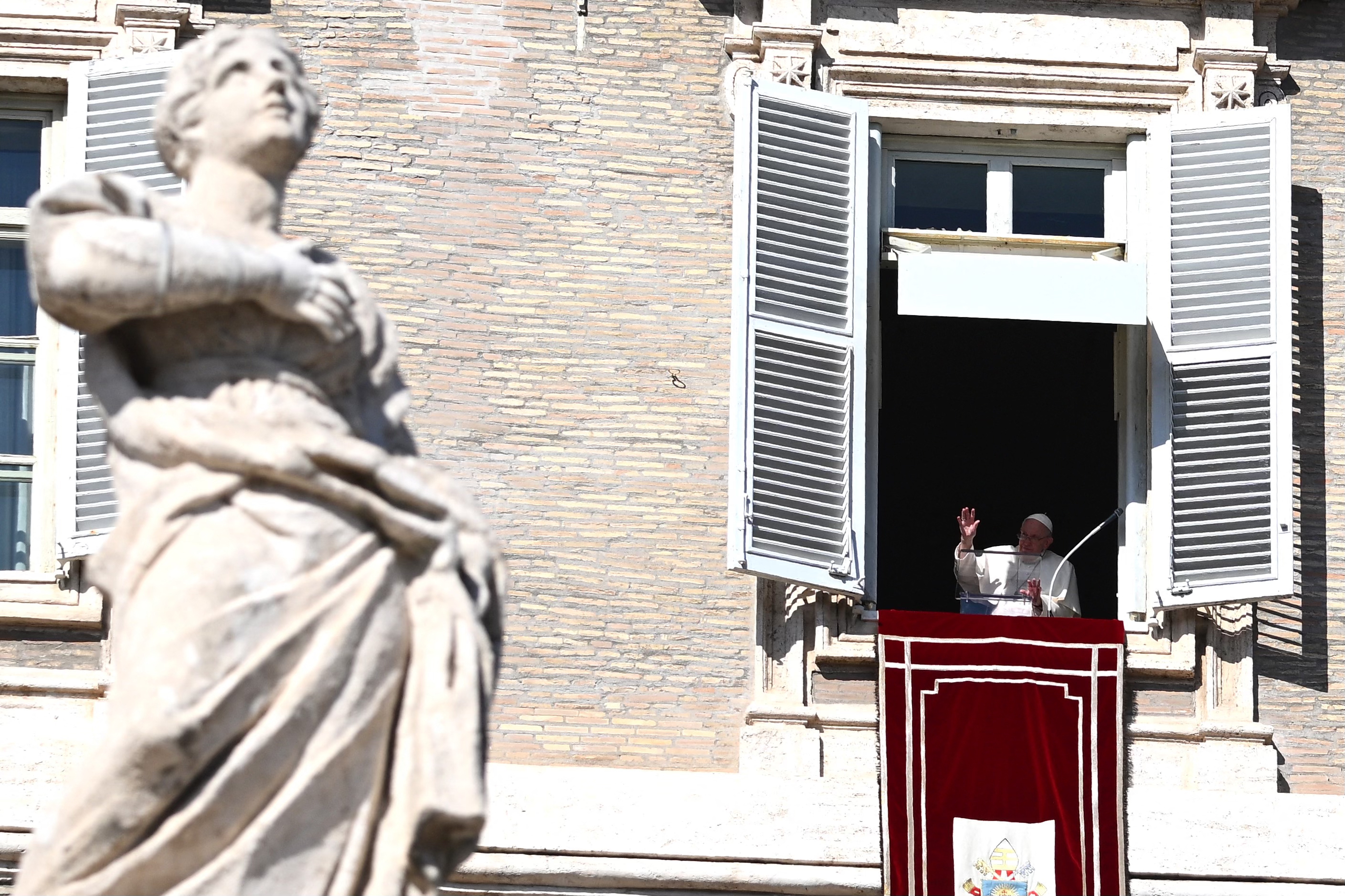Pope Francis blesses the crowd during his Angelus prayer marking the All Saints’ Day (Getty Images)
