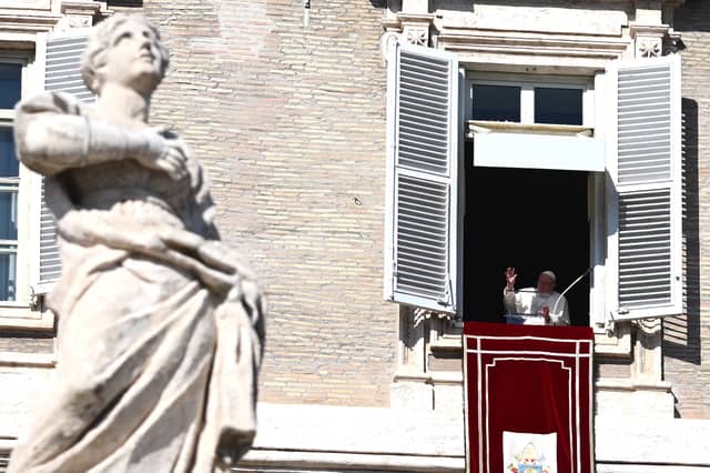 Pope Francis blesses the crowd during his Angelus prayer marking the All Saints’ Day (Getty Images)