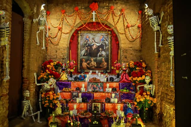 A traditional ‘Dia de Muertos’ offering is set up ahead of ‘Day of the Dead’ celebrations at Jalatlaco neighborhood in Mexico (Getty Images)
