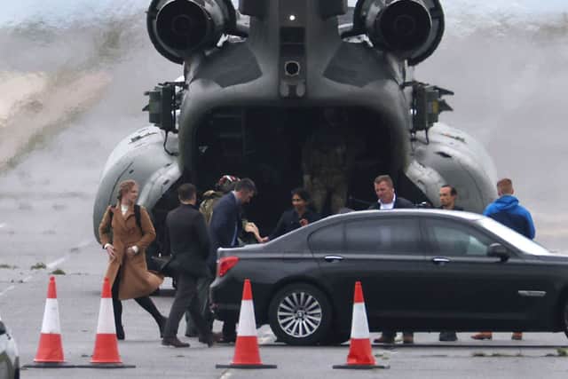 Home Secretary Suella Braverman arrives by helicopter at the migrant processing facility at Manston Airfield. Credit: Getty Images