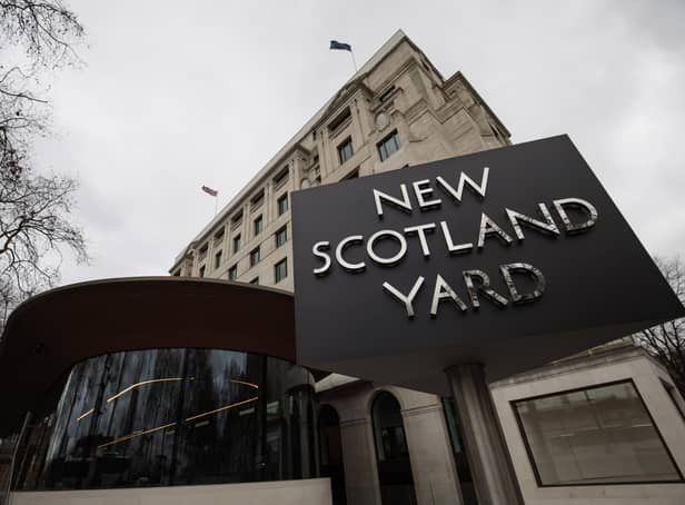 <p>The New Scotland Yard logo is displayed on a revolving sign outside the Curtis Green Building. Photo: Getty</p>