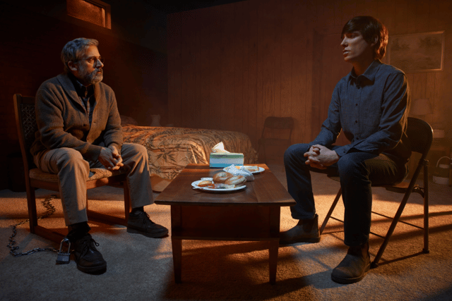 Steve Carrell as Alan Strauss, chained to a chair, and Domhnall Gleeson as Sam Fortner in The Patient (Credit: Frank Ockenfells/FX)