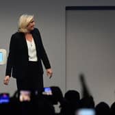 Newly elected French far-right party Rassemblement National (RN)’s president Jordan Bardella, next to French far-right party Rassemblement National (RN) parliamentary group leader Marine Le Pen (L). (Photo by ALAIN JOCARD/AFP via Getty Images)