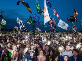 PILTON, ENGLAND - JUNE 25:  The crowd enjoys the atmosphere as Ed Sheeran headlines on the Pyramid Stage during day 4 of the Glastonbury Festival 2017 at Worthy Farm, Pilton on June 25, 2017 in Glastonbury, England.  (Photo by Ian Gavan/Getty Images)