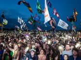 PILTON, ENGLAND - JUNE 25:  The crowd enjoys the atmosphere as Ed Sheeran headlines on the Pyramid Stage during day 4 of the Glastonbury Festival 2017 at Worthy Farm, Pilton on June 25, 2017 in Glastonbury, England.  (Photo by Ian Gavan/Getty Images)