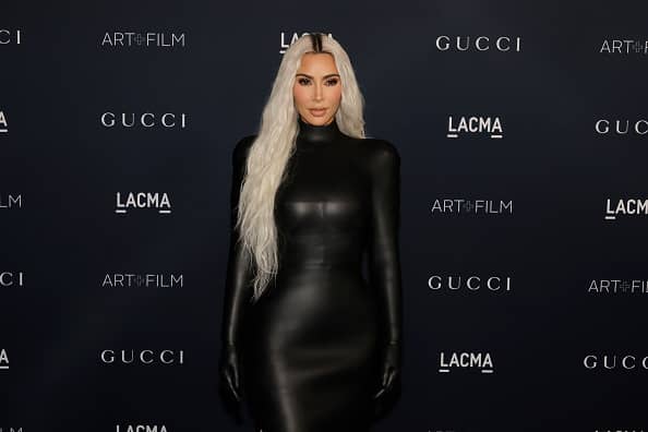  Kim Kardashian wowed in a figure-hugging black vinyl dress.  (Photo by Kevin Winter/Getty Images)
