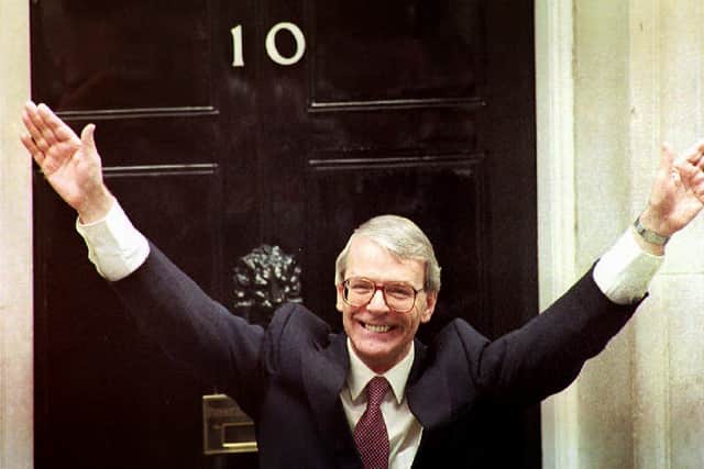 John Major in April 1992, celebrating his election win outside 10 Downing Street (Credit: JOHNNY EGGITT/AFP via Getty Images)