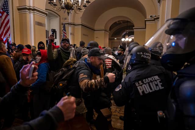 Trump supporters rushed the US Capitol building on January 6 2021 in an attempt to stop the Congress from counting the electoral votes of the 2020 election. (Credit: Getty Images)