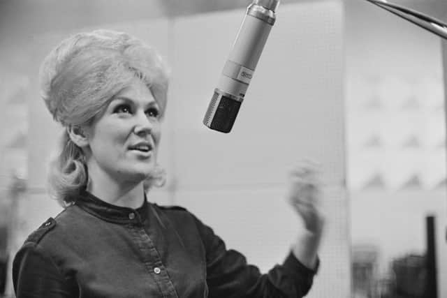 English singer and record producer Dusty Springfield (1939 - 1999) recording her first solo single 'I Only Want to Be with You' at Olympic Studios, London, UK, 22nd October 1963. (Photo by Mike McKeown/Daily Express/Hulton Archive/Getty Images)