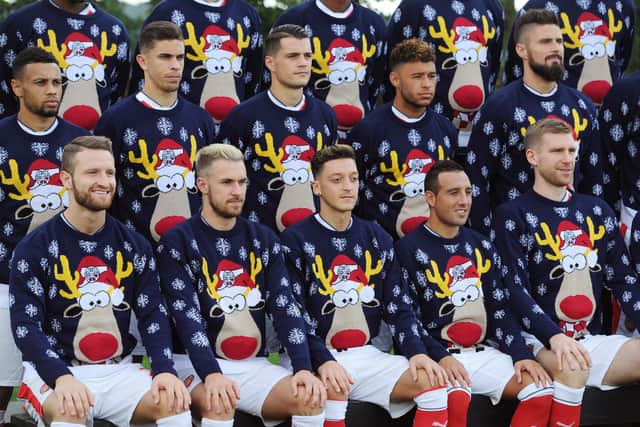 A number of high profile sports teams have supported Christmas Jumper day in the past including Arsenal in 2016 (Getty Images)
