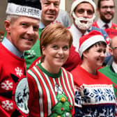 Nicola Sturgeon promoting Save the Children’s Christmas jumper day in 2017 (Getty Images)