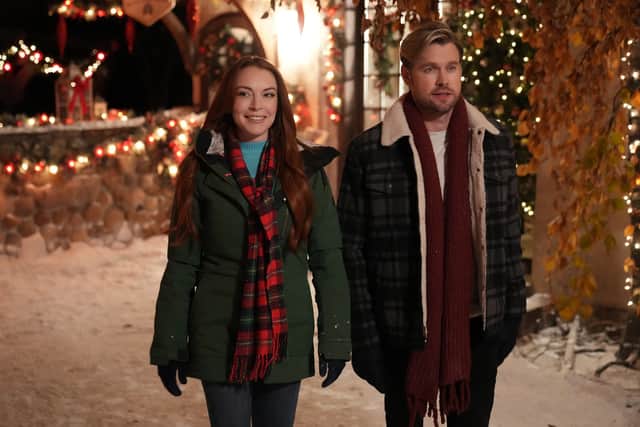 Lindsay Lohan as Sierra and Chord Overstreet as Jake in Falling for Christmas (Pic: Scott Everett White/Netflix)