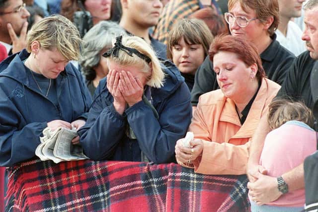 Members of the public cry at Princess Diana’s funeral in 1997 (Pic: AFP via Getty Images)