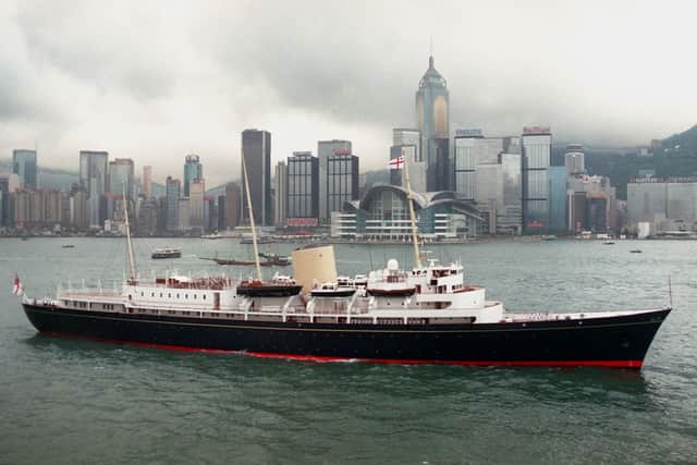 Her Majesty’s Ship the royal yacht Britannia steams past Hong Kong (Photo: DAN GROSHONG/POOL/AFP via Getty Images)