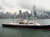 Her Majesty’s Ship the royal yacht Britannia steams past Hong Kong (Photo: DAN GROSHONG/POOL/AFP via Getty Images)