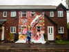 Christmas lover transforms home in to a giant gingerbread house featuring Quality Street chocolates