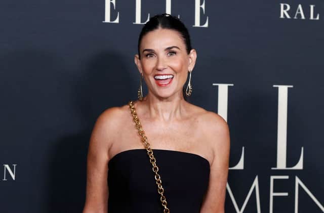 Demi Moore is at the top of our who's hot list today as she looks simply sensational at 60. (Photo by MICHAEL TRAN/AFP via Getty Images)