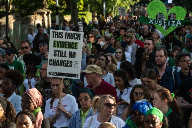 Protestors take part in the 5th annual Silent Walk at Grenfell Tower on June 14, 2022 in London. Credit: Getty Images
