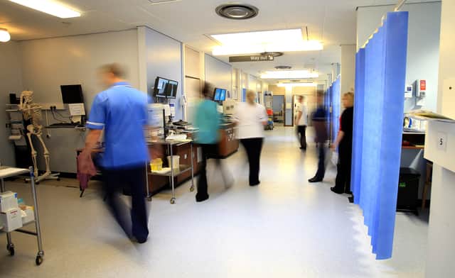 Staff shortages and rising demand are amongst the factors driving NHS bosses to hire agency workers. Credit: PA