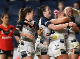 England celebrate win over Papua New Guinea in WRLWC group stage 