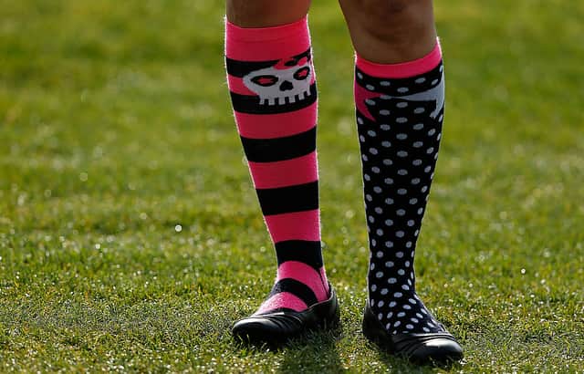 <p>A golf fan is seen during crazy sock day in the third round of the Shell Houston Open at the Redstone Golf Club in 2013 (Photo: Scott Halleran/Getty Images)</p>
