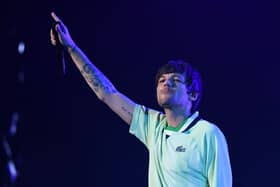 Louis Tomlinson has cancelled album signings across the UK (image: AFP/Getty Images)