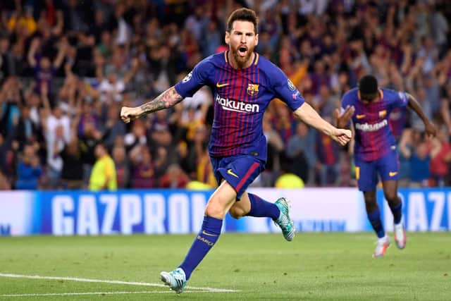 Lionel Messi of Barcelona celebrates scoring his sides first goal during the UEFA Champions League Group D match between FC Barcelona and Juventus at Camp Nou on September 12, 2017 in Barcelona, Spain.  (Photo by Alex Caparros/Getty Images)