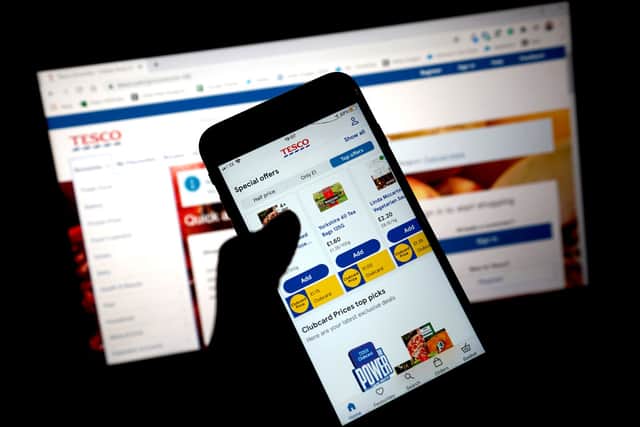 Tesco customers have faced difficulty securing supermarket delivery slots on its website and app (image: Getty Images)
