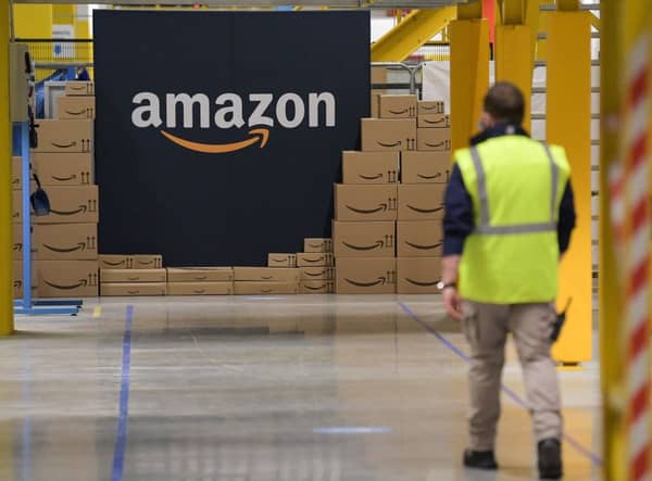 Amazon has warned the public to remain vigilant of fraudsters posing as the website to steal personal information this festive season (Photo by SEBASTIEN BOZON/AFP via Getty Images)