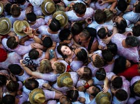 Revellers enjoy the atmosphere during the opening day or ‘Chupinazo’ of the San Fermin Running of the Bulls fiesta in 2015 in Spain (Photo: David Ramos/Getty Images)