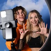 TikTok influencers Florin Vitan (L) and Alessia Lanza perform a video for the social network (Photo: MIGUEL MEDINA/AFP via Getty Images)
