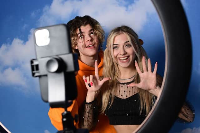 TikTok influencers Florin Vitan (L) and Alessia Lanza perform a video for the social network (Photo: MIGUEL MEDINA/AFP via Getty Images)