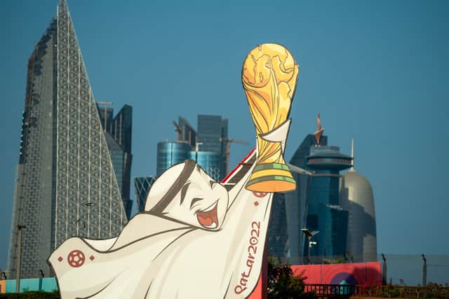 Qatar World Cup mascot La’eeb on a building in Doha