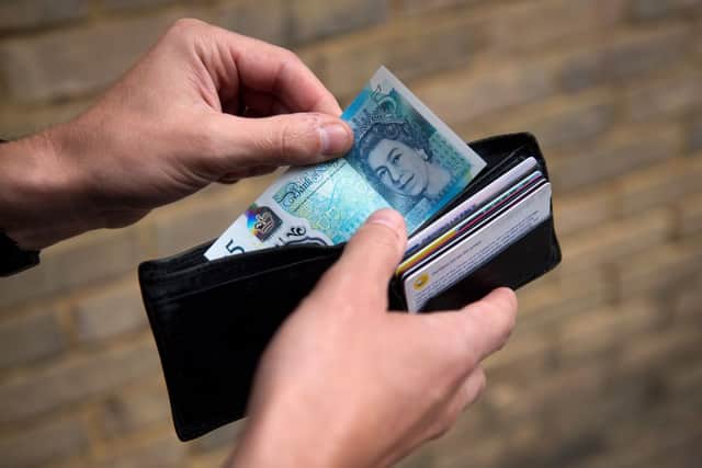 The amount that a person can receive on means-tested benefits can vary (Photo by JUSTIN TALLIS/AFP via Getty Images)