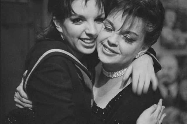 American actress and singer Liza Minnelli with her mother, American actress and singer Judy Garland (1922 - 1969), backstage after she opened in 'Flora the Red Menace' at the Alvin Theatre, New York, US, 11th May 1965. (Photo by Regan/Daily Express/Hulton Archive/Getty Images)
