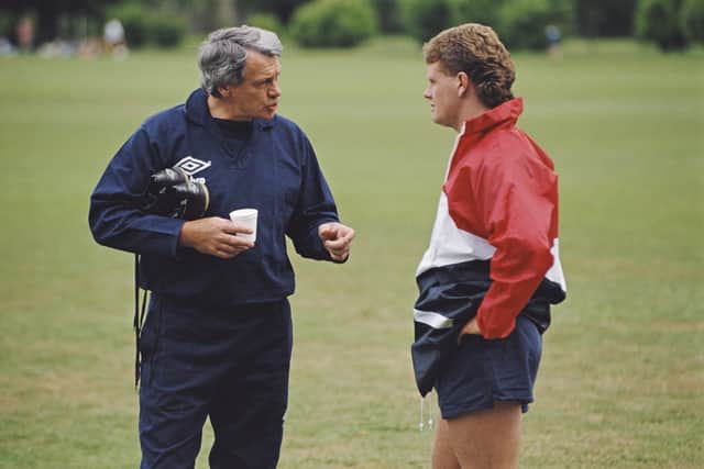 Former England manager Bobby Robson talks with player Paul Gascoigne during a training session in 1990. (Getty Images)