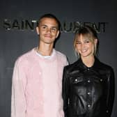 Romeo Beckham and Mia Regan attend the Saint-Laurent Womenswear Fall/Winter 2022/2023 show as part of Paris Fashion Week on March 01, 2022 in Paris, France. (Photo by Pascal Le Segretain/Getty Images)