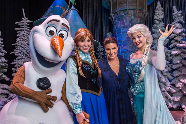 Idina Menzel poses with Elsa, Anna and Olaf from Disney’s “Frozen” at Disney’s Hollywood Studios theme park (Pic: Getty Images)
