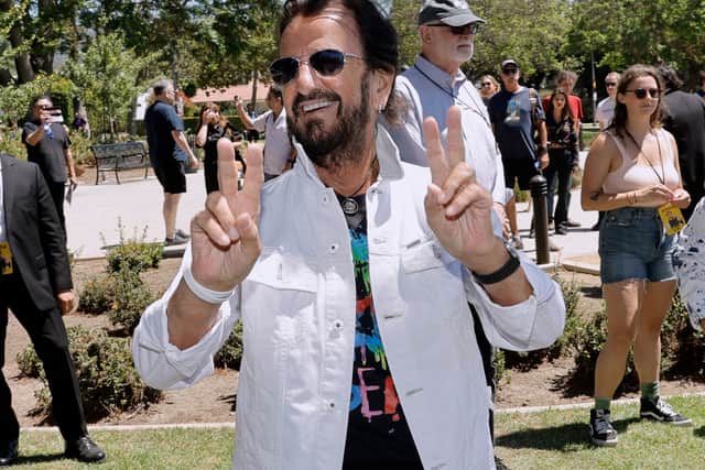 Sir Ringo’s iconic pose. Image: Kevin Winter/Getty