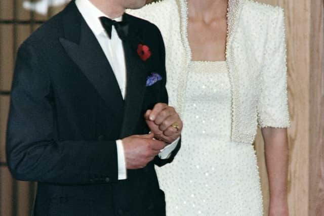 Diana, the late Princess of Wales, wore the Lover's Knot Tiara during a state visit to Hong Kong in 1989. (Photo by MARC FALLANDER/AFP via Getty Images)