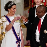 Catherine, Princess of Wales, toasts  Cyril Ramaphosa, the president of South Africa. (Photo by Aaron Chown - Pool /Getty Images). 