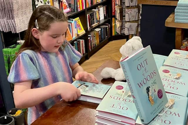 Betsy Griffin, a 9-year-old brain tumour patient, has written a book about positivity, kindness and hope called Out of the Woods.