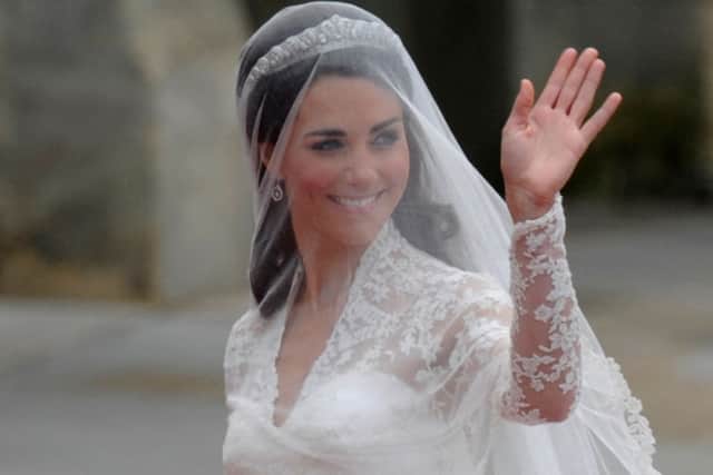 Catherine, Princess of Wales wore a different Tiara for her wedding day. She wore a Cartier Halo Tiara. (Photo by ODD ANDERSEN/AFP via Getty Images)