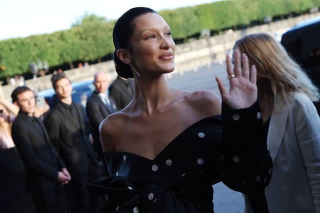Bella Hadid arriving at a Balenciaga dinner in Paris before the fallout began from the campaign. (Photo by Vittorio Zunino Celotto/Getty Images)