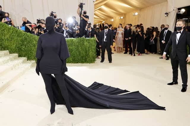 Who can forget this 'memorable' for all the wrong reasons outfit Kim Kardashian wore for the Met Gala in 2021? (Photo by Mike Coppola/Getty Images)