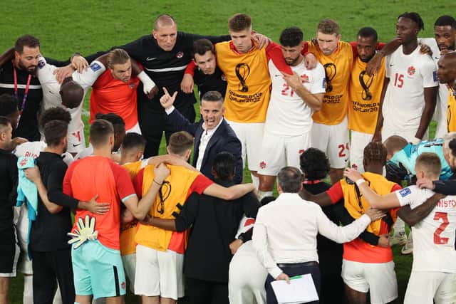 John Herdman, Head Coach of Canada, speaks to their team after the 0-1 loss the FIFA World Cup Qatar 2022 Group F match between Belgium and Canada at Ahmad Bin Ali Stadium on November 23, 2022 in Doha, Qatar. (Photo by Richard Heathcote/Getty Images)