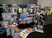 Oscar Sheard, aged10, has used his pocket money to buy gifts for children who may not otherwise receive them and has now collected just under 100 presents.