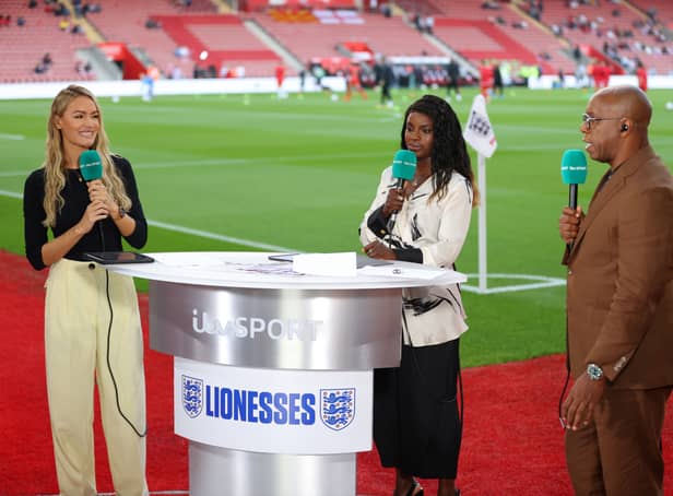 <p>Laura Woods, Eni Aluko and Ian Wright report pitchside for ITV Sport. (Getty Images)</p>